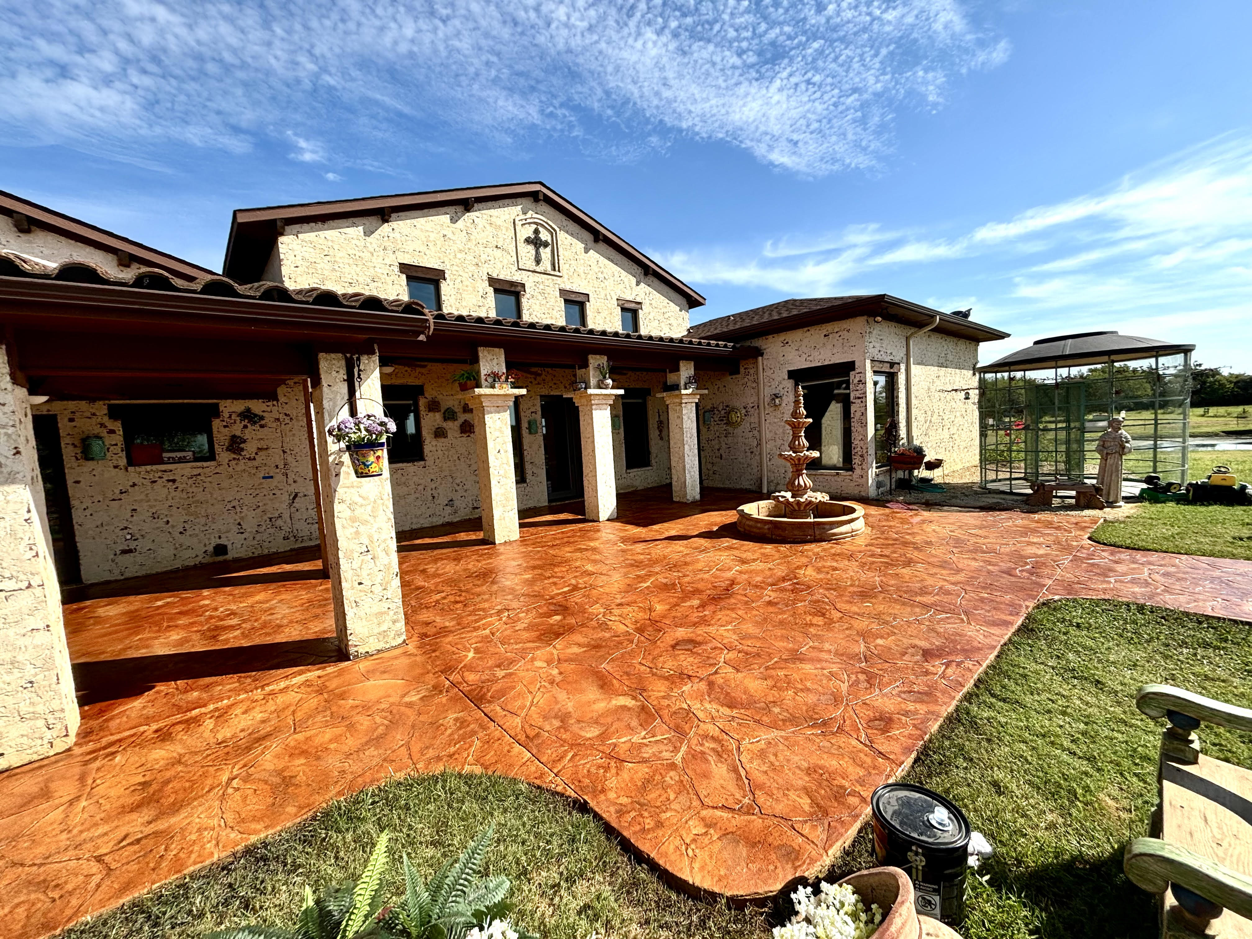 Beautifully acid-stained concrete patio by Carpenter Coating