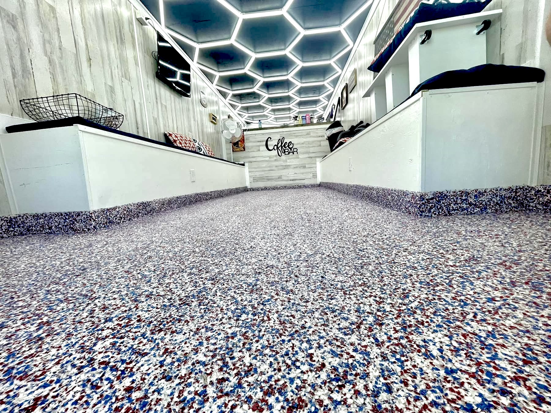 Full broadcast color flake epoxy floor by Carpenter Coating