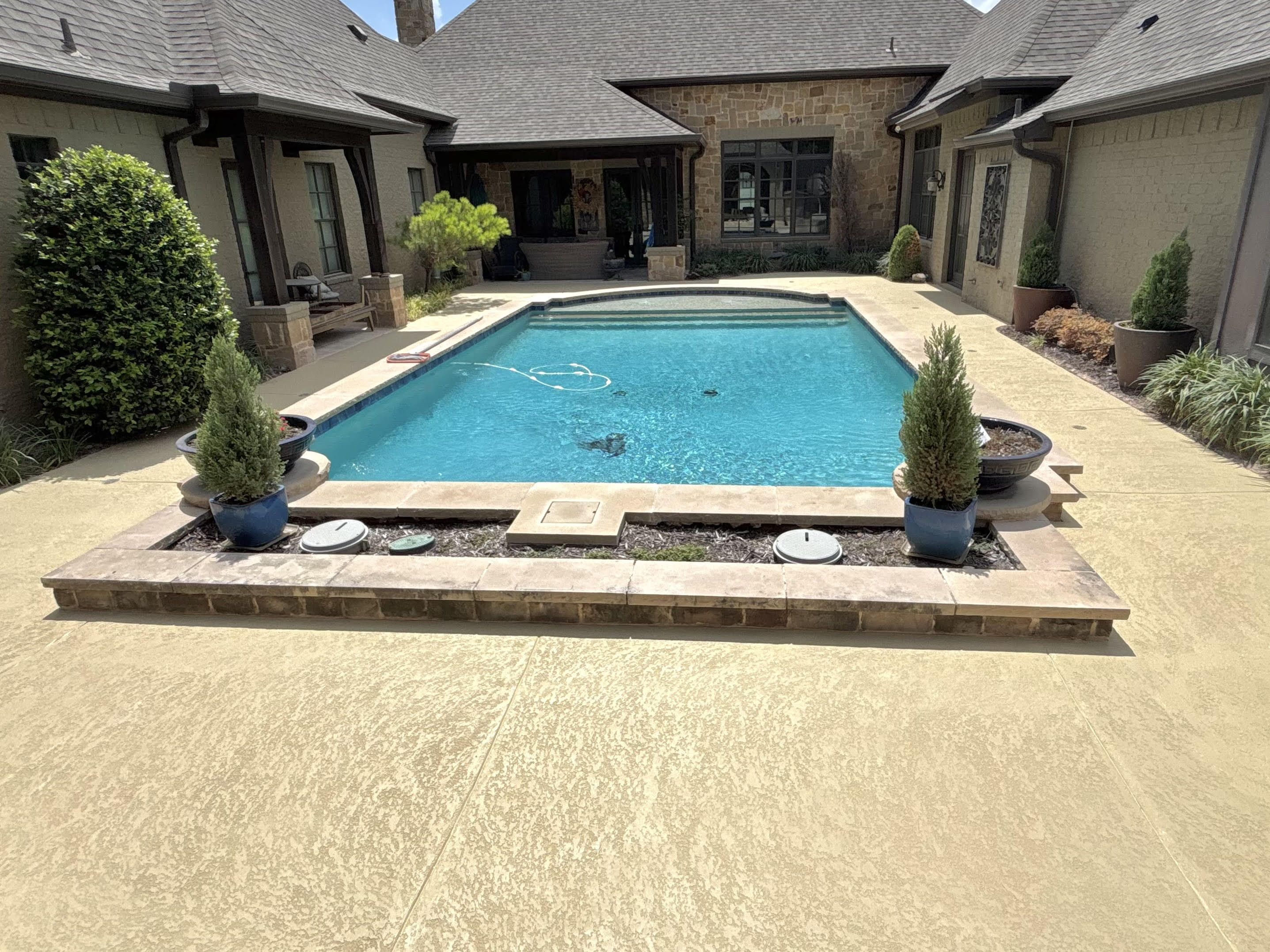 Luxurious pool deck with heat-reflective coating by Carpenter Coating